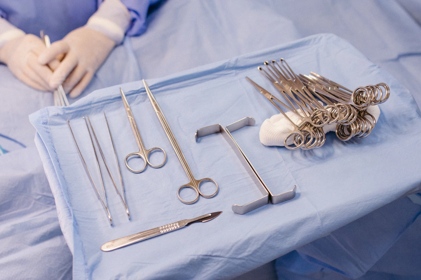 Surgical instruments laid out on a sterile tray before an operation